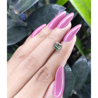 0.96 Ct. Green Sapphire from Madagascar Life Style