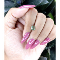 0.96 Ct. Green Sapphire from Madagascar Life Style