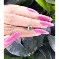 1.02 Ct. Bluish Green Sapphire from Madagascar Life Style