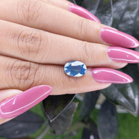 3.03 Ct. Greenish Blue Sapphire from Madagascar Life Style