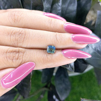 1.09 Ct. Bluish Green Sapphire from Madagascar Life Style