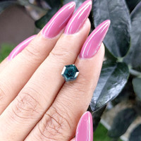 2.66 Ct. Bluish Green Sapphire from Madagascar Life Style