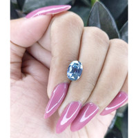 3.14 Ct. Greenish Blue Sapphire from Madagascar Life Style