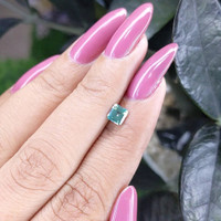 0.58 Ct. Bluish Green Sapphire from Madagascar Life Style