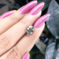 2.37 Ct. Yellowish Green Sapphire from Madagascar Life Style