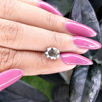 2.37 Ct. Yellowish Green Sapphire from Madagascar Life Style