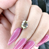 2.37 Ct. Yellowish Green Sapphire from Madagascar Life Style