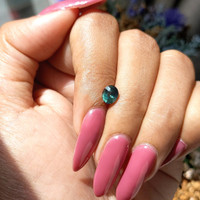 1.06 Ct. Bluish Green Sapphire from Madagascar Life Style