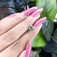 0.99 Ct. Bluish Green Sapphire from Madagascar Life Style