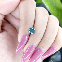 0.98 Ct. Greenish Blue Sapphire from Madagascar Life Style