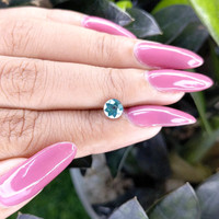 0.98 Ct. Greenish Blue Sapphire from Madagascar Life Style