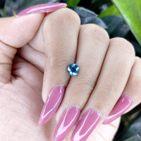 0.97 Ct. Greenish Blue Sapphire from Madagascar Life Style