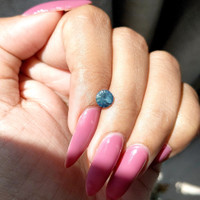 1.09 Ct. Bluish Green Sapphire from Madagascar Life Style