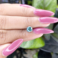 1.09 Ct. Bluish Green Sapphire from Madagascar Life Style