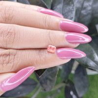 0.58 Ct. Padparadscha Sapphire from Tanzania Life Style