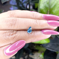 1.02 Ct. Greenish Blue Sapphire from Madagascar Life Style