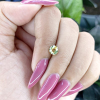 1.00 Ct. Yellowish Green Sapphire from Madagascar Life Style