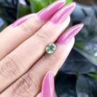 0.98 Ct. Bluish Green Sapphire from Madagascar Life Style