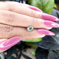 0.99 Ct. Bluish Green Sapphire from Madagascar Life Style