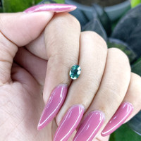 1.00 Ct. Bluish Green Sapphire from Madagascar Life Style