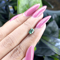 1.00 Ct. Bluish Green Sapphire from Madagascar Life Style