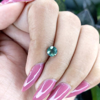 1.01 Ct. Bluish Green Sapphire from Madagascar Life Style