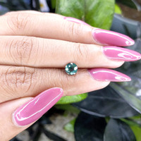 1.01 Ct. Bluish Green Sapphire from Madagascar Life Style