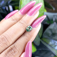 1.03 Ct. Yellowish Green Sapphire from Madagascar Life Style