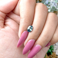 1.10 Ct. Greenish Blue Sapphire from Madagascar Life Style