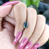 1.27 Ct. Bluish Green Sapphire from Madagascar Life Style