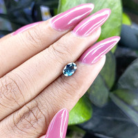 1.05 Ct. Greenish Blue Sapphire from Madagascar Life Style