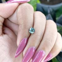 0.94 Ct. Bluish Green Sapphire from Madagascar Life Style