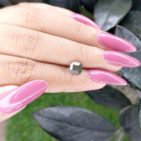 1.42 Ct. Brownish Green Sapphire from Tanzania Life Style