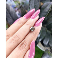 1.42 Ct. Brownish Green Sapphire from Tanzania Life Style