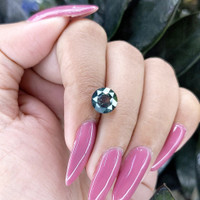 3.97 Ct. Bluish Green Sapphire from Tanzania Life Style