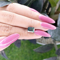 2.53 Ct. Bluish Green Sapphire from Tanzania Life Style