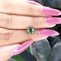 2.06 Ct. Bluish Green Sapphire from Tanzania Life Style