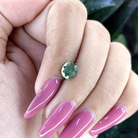 1.64 Ct. Bluish Green Sapphire from Tanzania Life Style