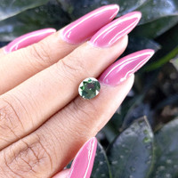 1.64 Ct. Bluish Green Sapphire from Tanzania Life Style