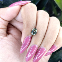 1.53 Ct. Green Sapphire from Tanzania Life Style