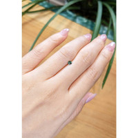 0.22 Ct. Bluish Green Sapphire from Thailand Life Style