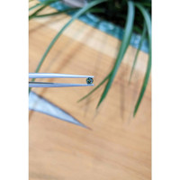 0.22 Ct. Bluish Green Sapphire from Thailand Life Style
