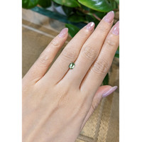 0.58 Ct. Green Sapphire from Madagascar Life Style