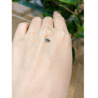 0.38 Ct. Greenish Blue Sapphire from Madagascar Life Style