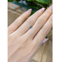 0.38 Ct. Greenish Blue Sapphire from Madagascar Life Style