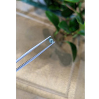 0.38 Ct. Greenish Blue Sapphire from Madagascar Life Style