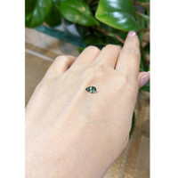 0.63 Ct. Bluish Green Sapphire from Madagascar Life Style