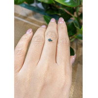 0.35 Ct. Bluish Green Sapphire from Madagascar Life Style