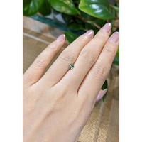 0.46 Ct. Bluish Green Sapphire from Madagascar Life Style