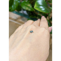 0.44 Ct. Greenish Blue Sapphire from Madagascar Life Style